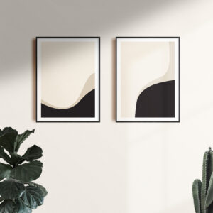Two black frames with the art print Right Here 02 and art print Right Here 04