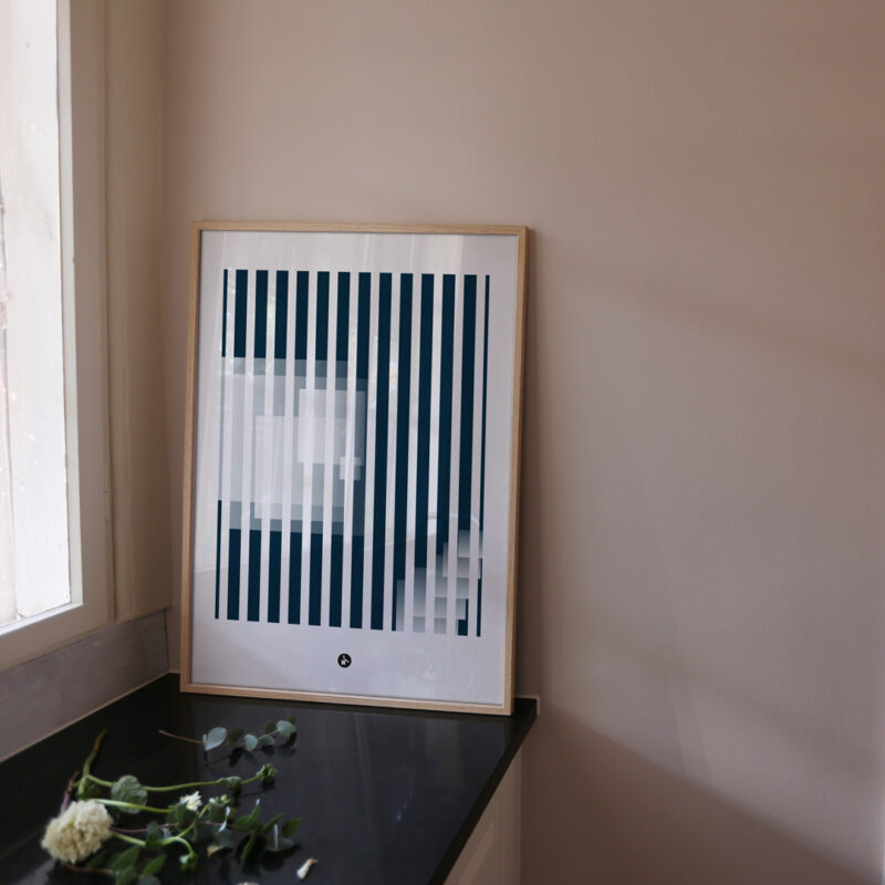 a frame with an art print with the title; Echo 02 standing on the kitchen table